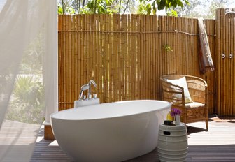 outdoor bath adjoining suites on thanda island