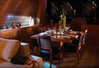 interior dining area in the main salon of charter yacht ‘Casino Royale’ 
