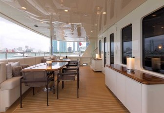 rectangular alfresco dining option on aft deck of luxury yacht SAFIRA 