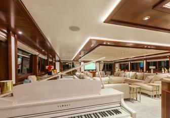 Piano in main lounge on O'MEGA superyacht