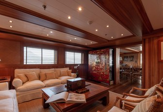 Comfortable living area on superyacht Bleu De Nimes with sofa and table