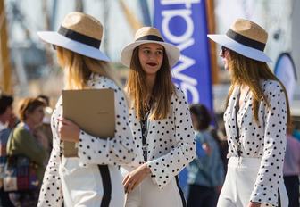 three women in matching polka dots at the Palma Superyacht Show 2018