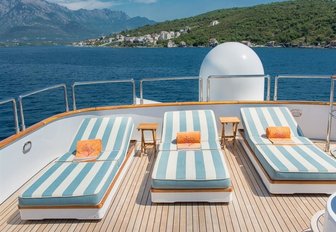 sun beds lined up on the sundeck of superyacht Cheetah Moon