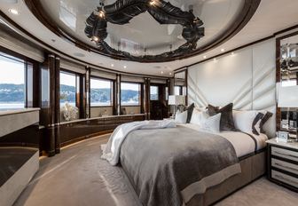 glamorous master suite with Art Deco styling and wonderful 180-degree views aboard charter yacht 11-11