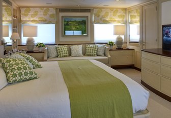 master suite with pale green and cream colour palette on board superyacht ANCALLIA 