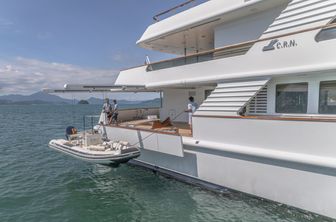 Charter yacht AZUL V at anchor with fold-down balcony