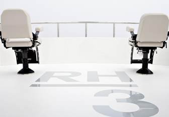 two chairs on the observation deck of charter yacht RH3 