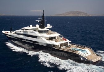  charter yacht Alfa Nero underway on a charter vacation with a view of her aft deck swimming pool