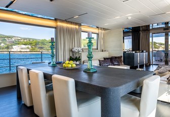 Dining table and chairs inside on motor yacht Cinquanta 50