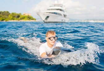 charter guest staying on board motor yacht DYNAR tries out a SeaBob