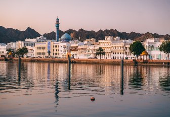 historic buildings lining the corniche in Muscat, Oman