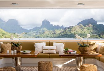 sumptuous seating area on the aft deck of charter yacht HELIOS