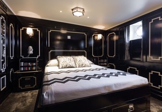 monochrome art deco-style double cabin on board charter yacht MALAHNE