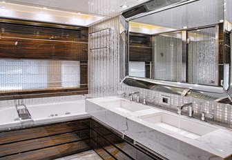 sleek and contemporary master bathroom aboard superyacht ‘Tutto Le Marrané’