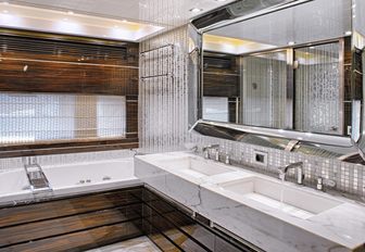 sleek and contemporary master bathroom aboard superyacht ‘Tutto Le Marrané’