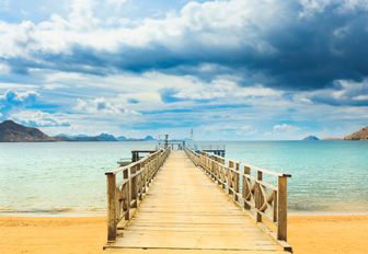 A pier leading into the water at Komodo Island