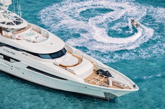 Superyacht charter AS YOU WISH and guest on Jet Ski