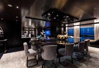 formal dining area in the main salon forward aboard motor yacht SOLO 