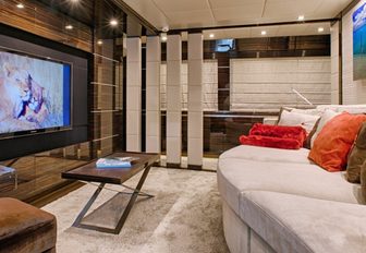 media room with comfortable sofa on board charter yacht ‘Tutto Le Marrané’
