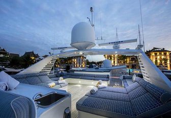 sunbeds and Jacuzzi on the sundeck of charter yacht DOA