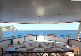 alfresco dining area on the main deck aft of luxury yacht ‘Heavenly Daze’