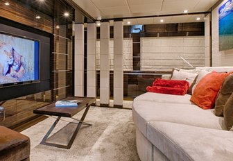 watch a movie in the media lounge aboard superyacht Tutto le Marrané