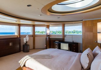 master suite with panoramic views and skylight on board motor yacht WHEELS