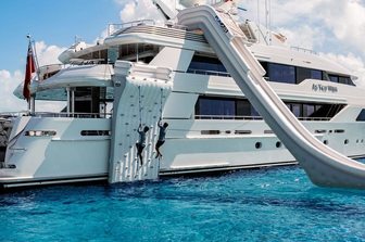 Superyacht charter AS YOU WISH floating platform water slide and climbing wall