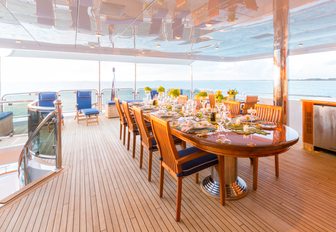 spacious alfresco dinning area on the upper deck aft of luxury yacht Lady Joy