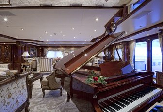 The grand piano featured in the main salon of superyacht Martha Ann
