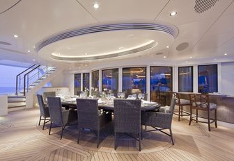 alfresco dining on the main deck aft of luxury yacht HEMISPHERE