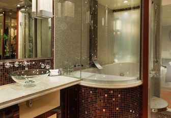 mosaic-clad en-suite bathroom on board charter yacht Grey Matters