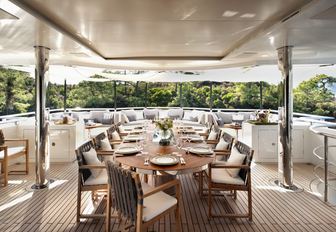 alfresco dining on upper deck aft of charter yacht ‘Orient Star’ 