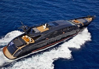 jet black superyacht O'PATI underway on a Greek yacht charter