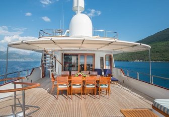 alfresco dining on spacious upper deck aft aboard charter yacht ‘Cheetah Moon’ 