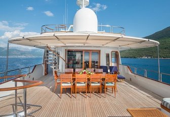 alfresco dining area on the aft deck of charter yacht Cheetah Moon