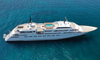 Mega yacht charter DREAM at anchor, surrounded by sea
