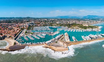 Elevated view of a marina with motor yacht charters berthed