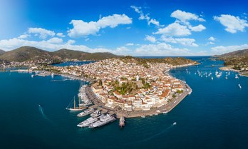 Aerial view of Poros Port with boat charters berthed