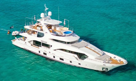 Explore the sunsoaked shores of a Bahamas yacht charter with 33M yacht rental REHAB