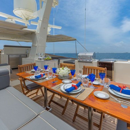 Alfresco dining layout onboard charter yacht ARIADNE