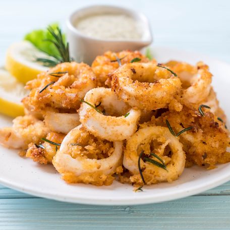 A white plate of calamari