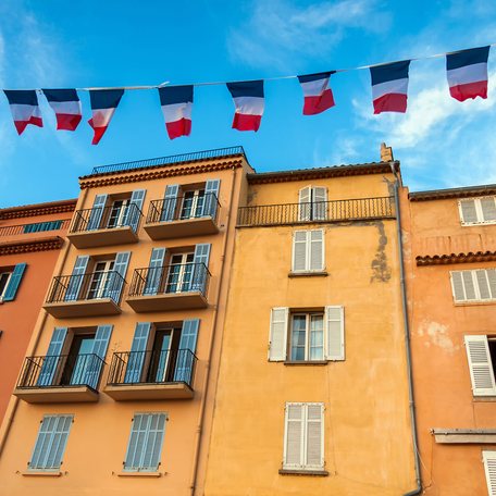 French flags flying in St Tropez Harbour