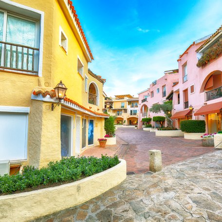 Colored buildings within Porto Cervo