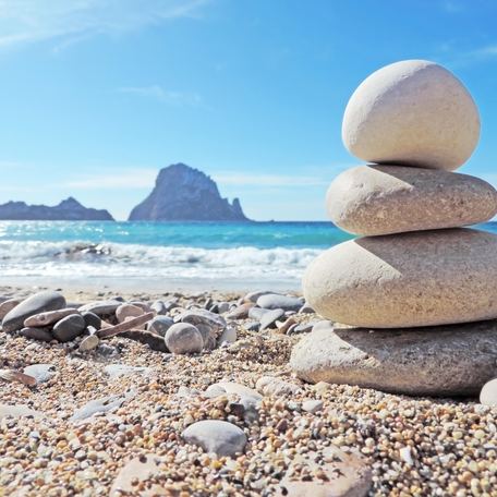 Stack of pebbles on a beach on the island of Ibiza