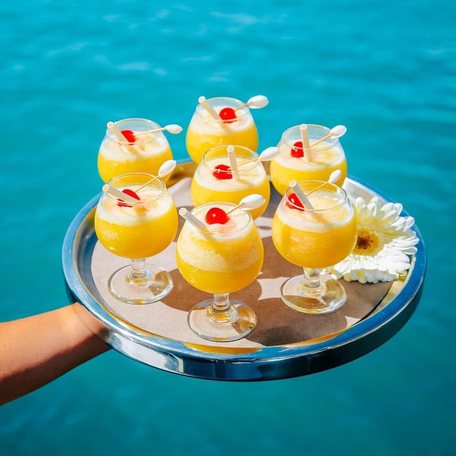 Tray of pineapple cocktails 