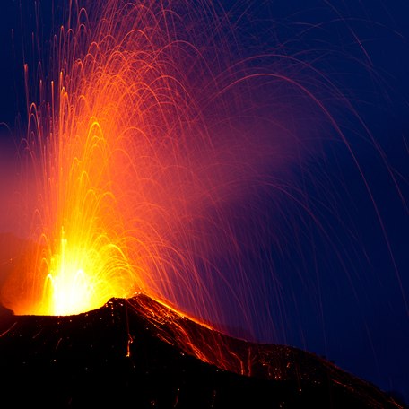 Lava flowing from the top of Mount Etna