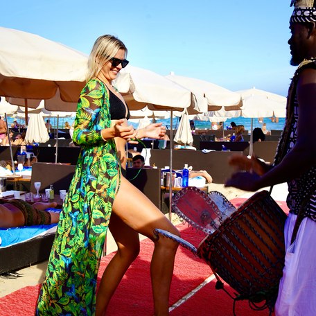 Nassau Beach Club guest dancing to music