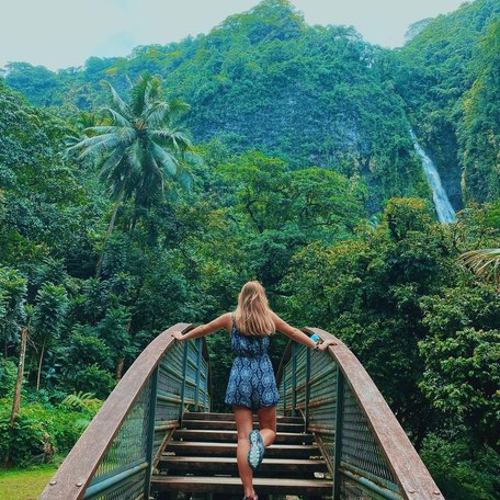Tahiti - Faarumai Waterfalls person on bridge