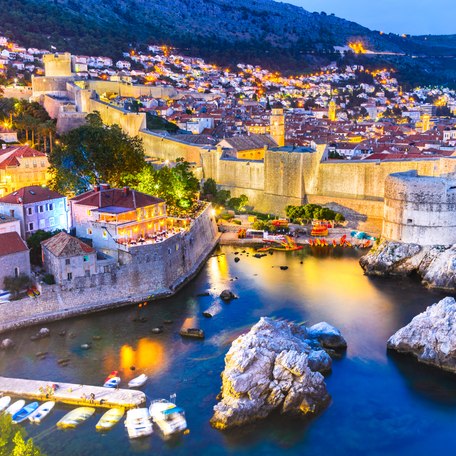 Overhead view looking at the stone walls of Dubrovnik at dusk